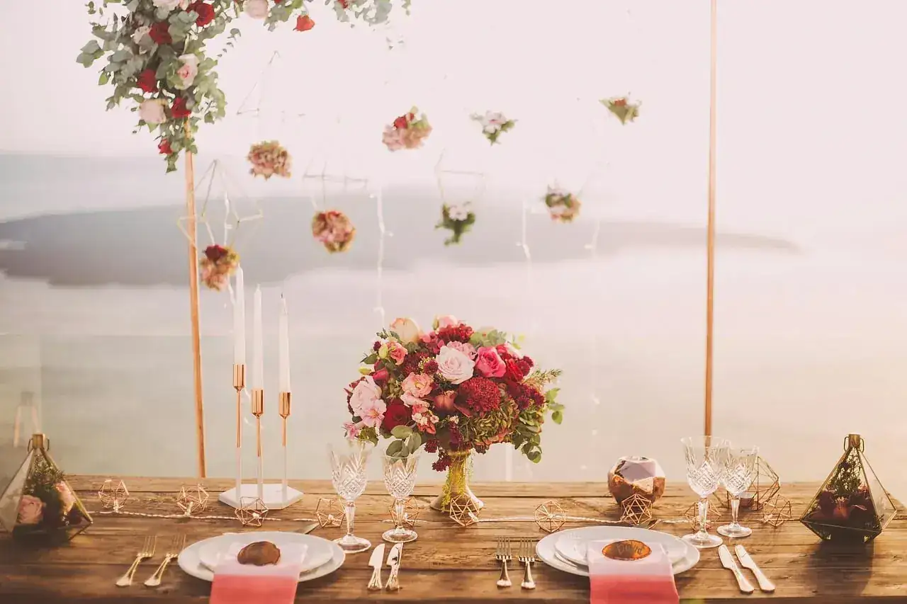 Celebration table dressed with flowers and candles