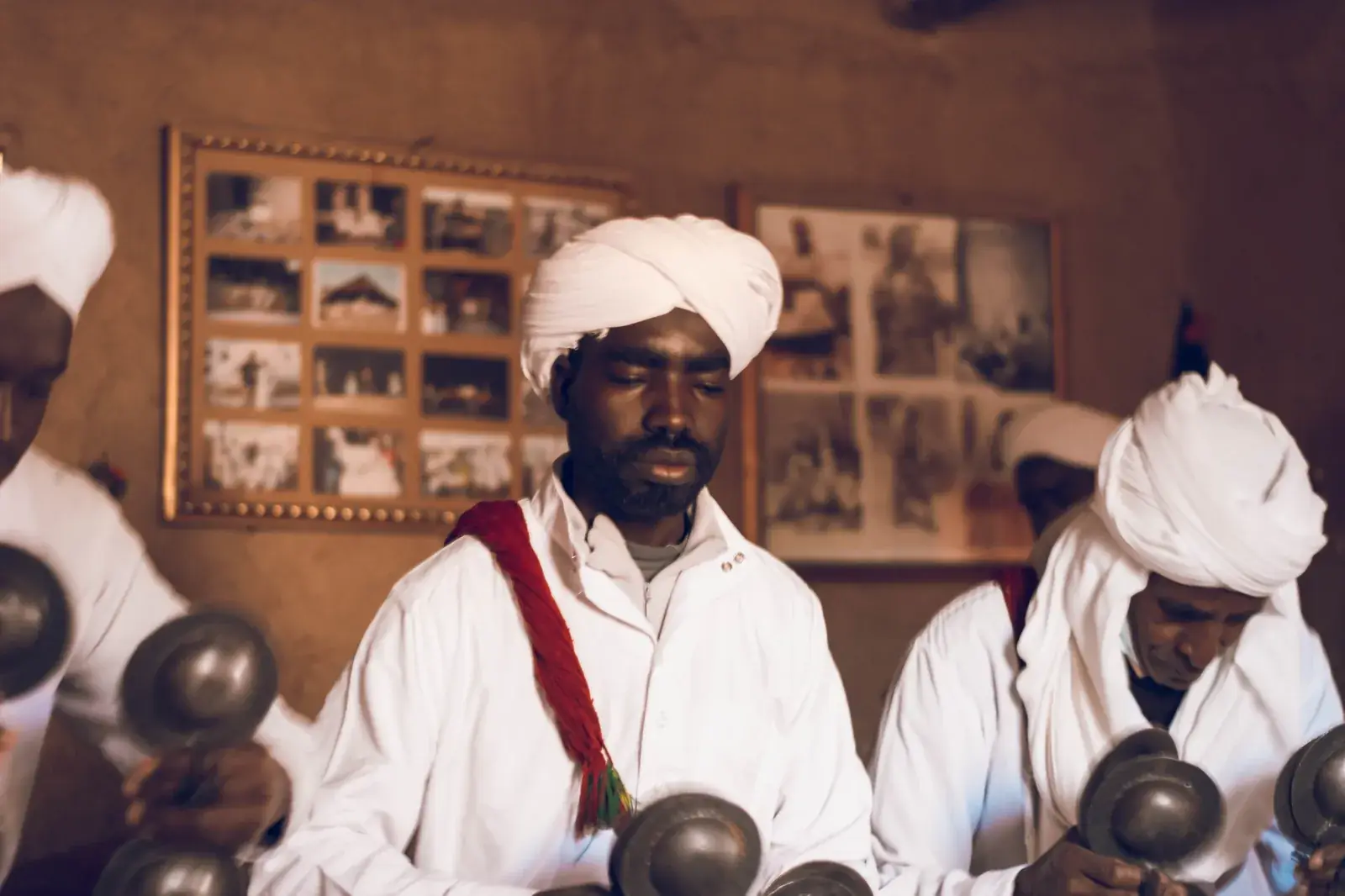 Gnawa musicians playing qraqeb in Khamlia village