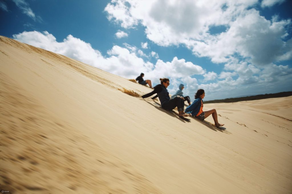 Saha sandboarding in the Merzouga desert sands